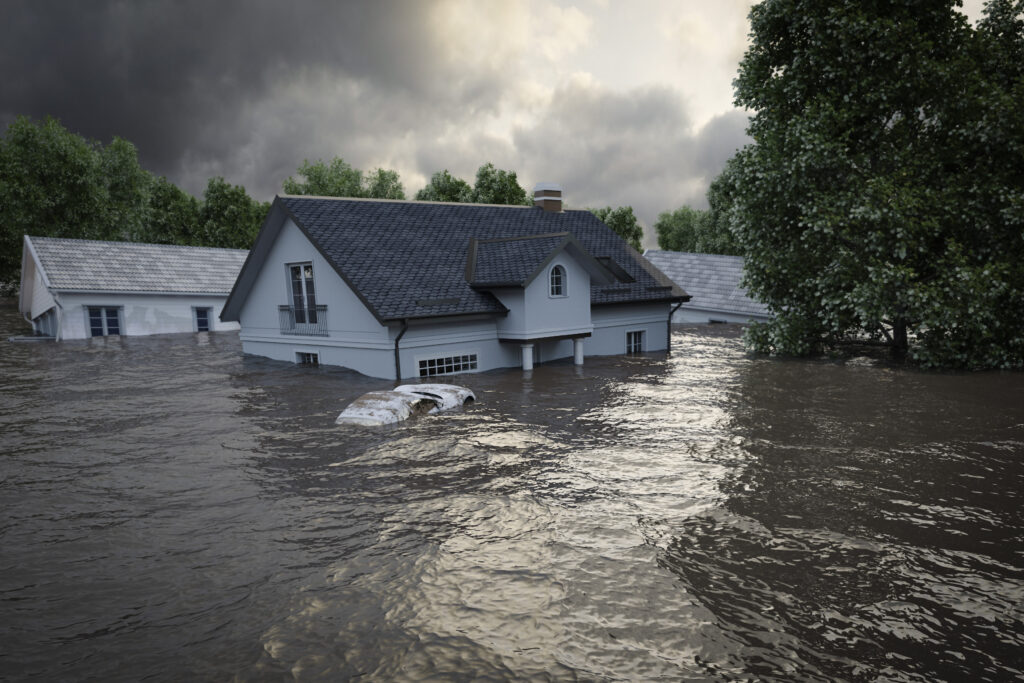 House surrounded by flood waters